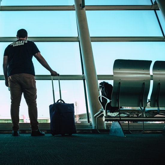 Man with a suitcase at the airport